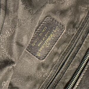 Vintage Paloma Picasso tote with gold chain logo under the bottom of the bag